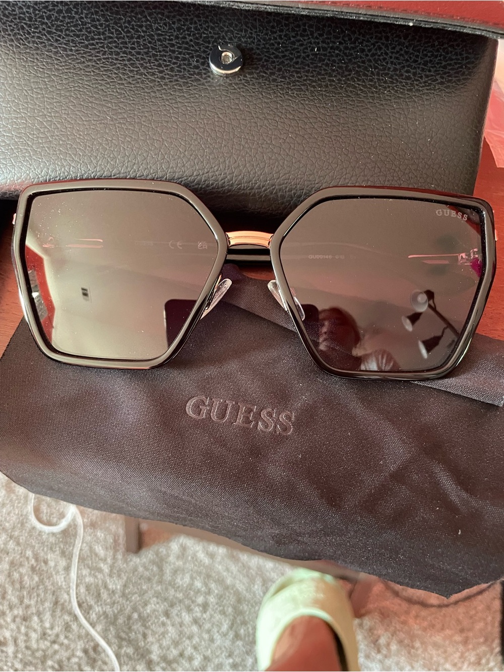 Guess Women's Black Geometric Sunglasses with Gold Bridge